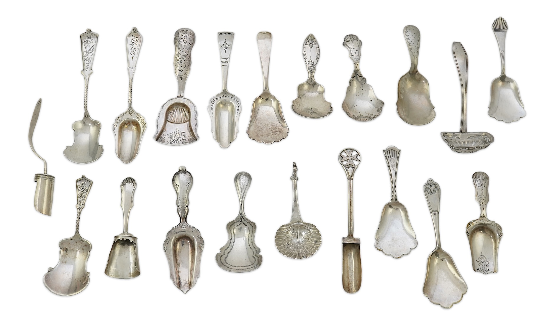 A collection of seventeen mainly 19th century Dutch white metal caddy spoons
